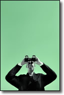Man looking in binoculars